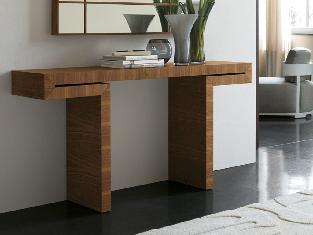 Porada console and mirror in curved walnut — organic Italian design and natural elegance.